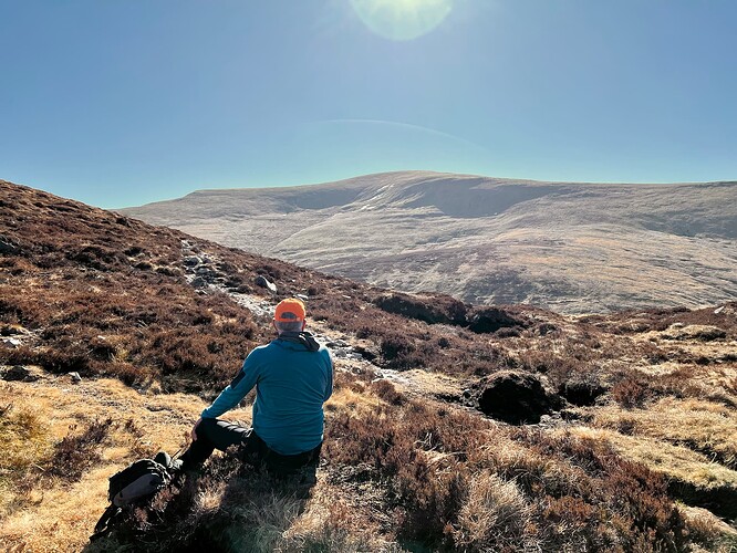 A sandwich before the climb, with Glas Tuaichean under the sun