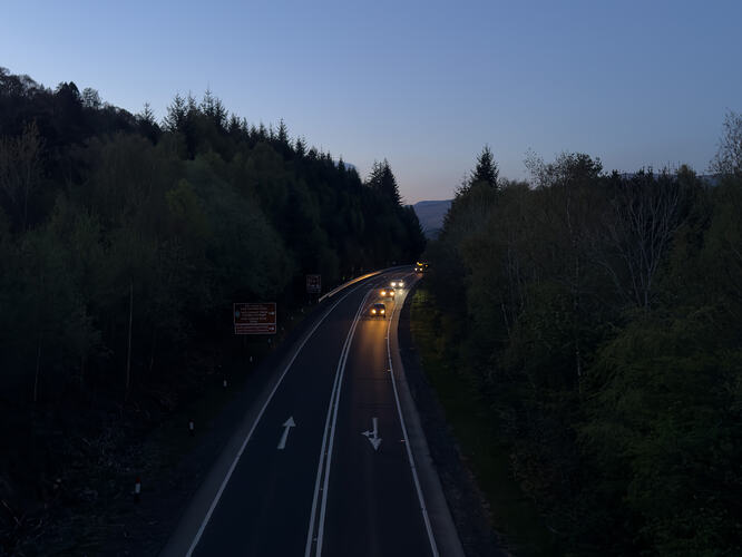 Cars on the A82 from the footbridge to Luss