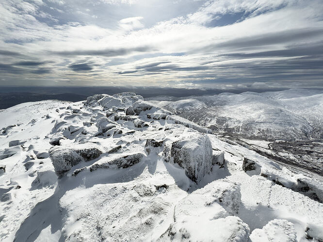 Snowy rocks on the summit of Schiehallion