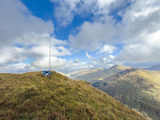 Slim G rigged on the small peak north of the summit