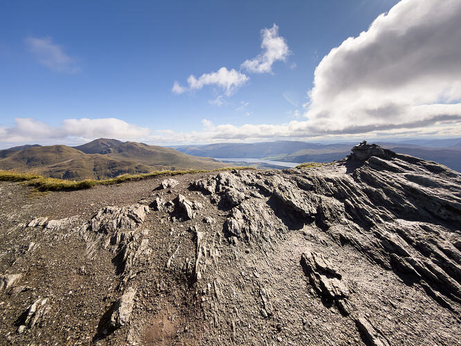 Meall nan Tarmachan summit looking to Ben Lawers and Loch Tay