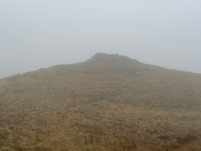 View of the summit shelter at Carleatheran (GM/SS-175) in the mist.