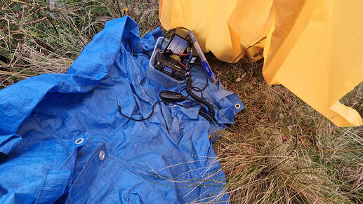 Trying to keep the radio dry.