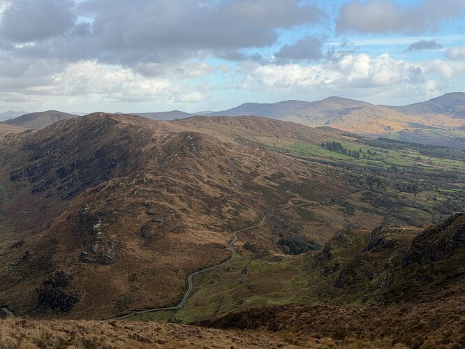 Broader view onto Castle Rock hill, with Beara Way and Caha Pass visible.