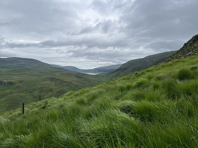 Descending by fence - view towards Loch Dee