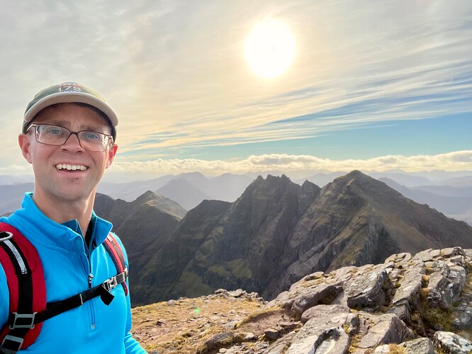 At the top with Sgurr Fiona behind