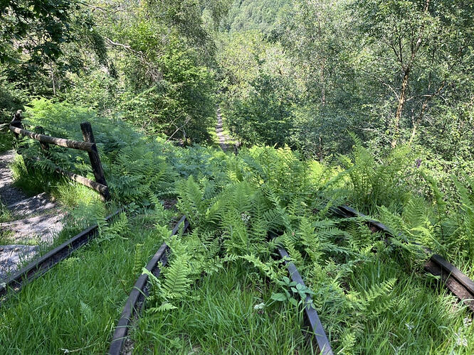 Looking down inclined plane with rails