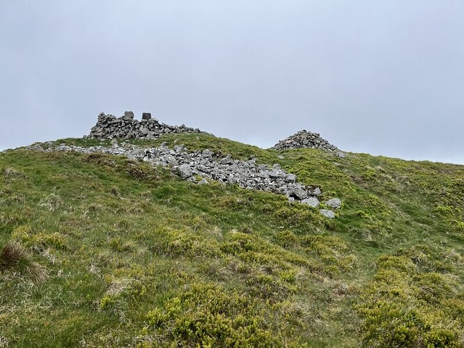 Trig shelter and cairn