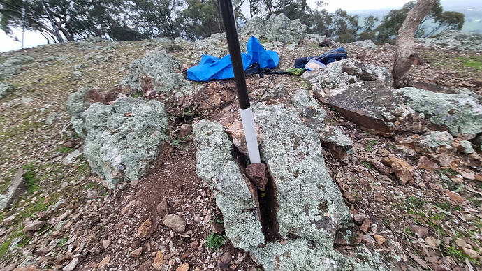 Mast base wedged into rock crevice at Mt Piper.