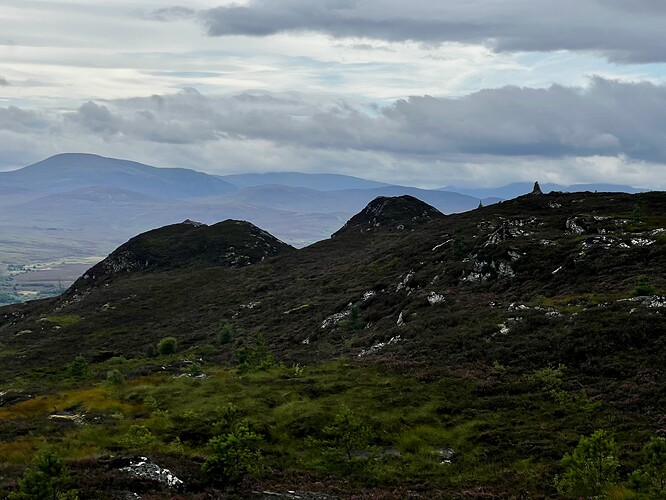 Summit cairn on right