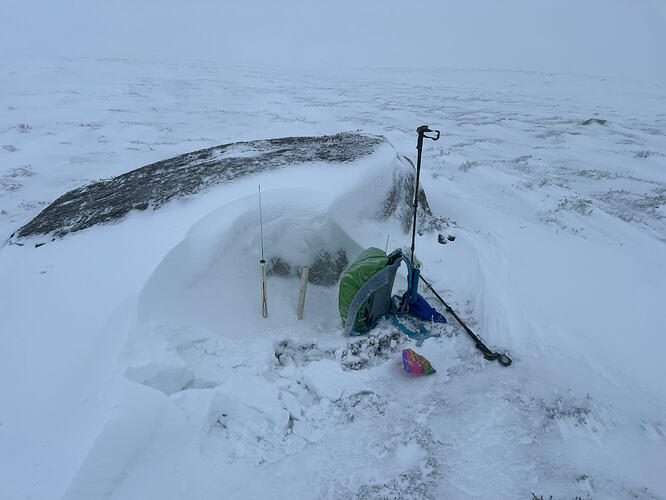 Hiding behind the boulder