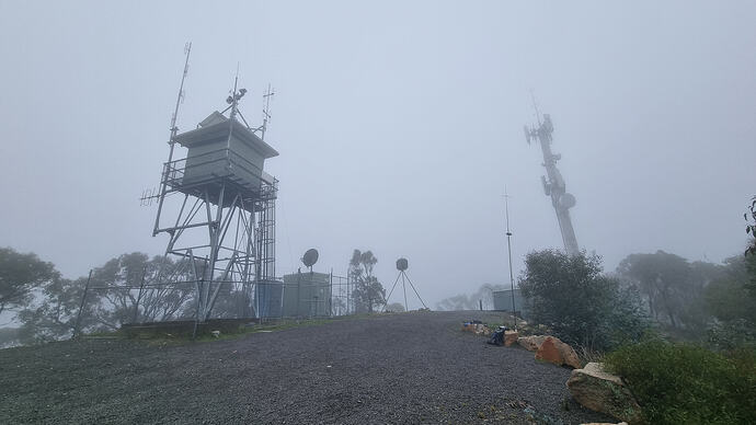 Fire spotting tower, trig point, mobile phone pole and my SOTA station at Mt Ida.