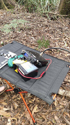 Radio and battery on portable table