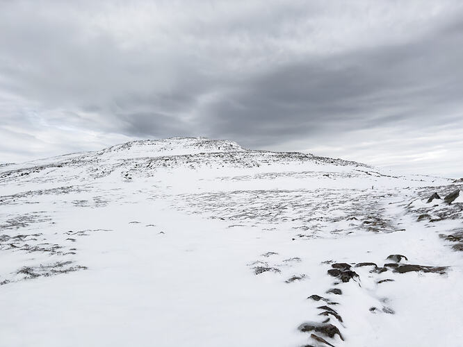 Soft snow covering the path leading towards Schiehallion's summit