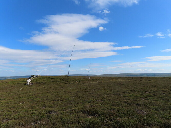 All three antennas: VHF/UHF in shelter, me operating HF on left, Neil's antenna in the background