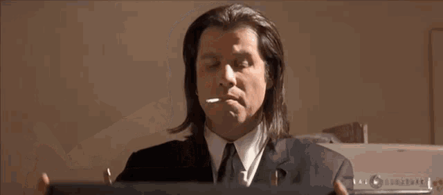 pulp-fiction-vincent-vega-smoking-72vtealhsrbv6p34